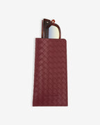 Clutch bordeaux en similicuir tressé