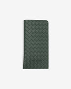 Pochette verte en similicuir tressé
