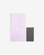 Pochette mauve en similicuir tressé